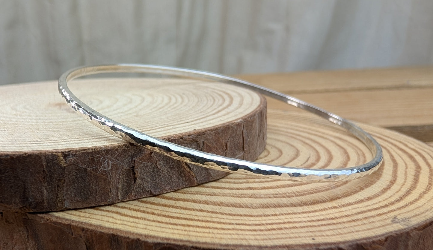 sterling silver curved hammered bangle