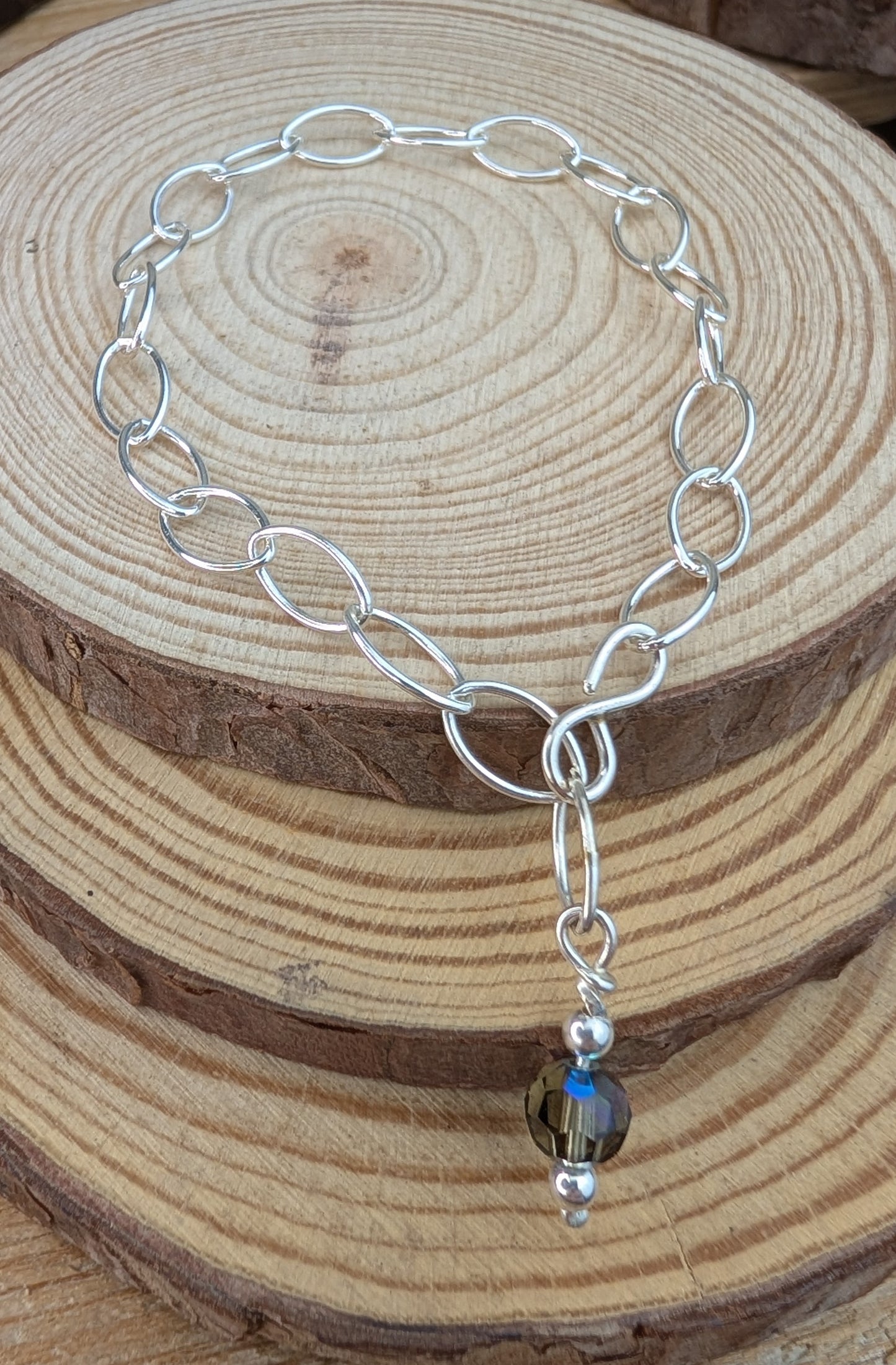 sterling silver navette trace chain bracelet with a black diamond Preciosa crystal bead